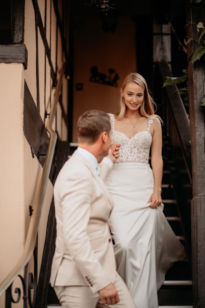 Émilie and Thomas on their wedding day in an Alsatian village